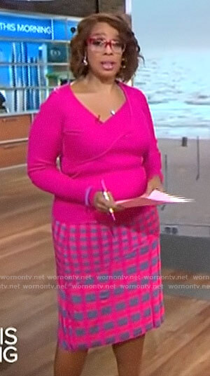 Gayle King’s pink asymmetric sweater and checked skirt on CBS Mornings