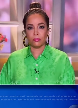 Sunny’s green floral satin blouse on The View