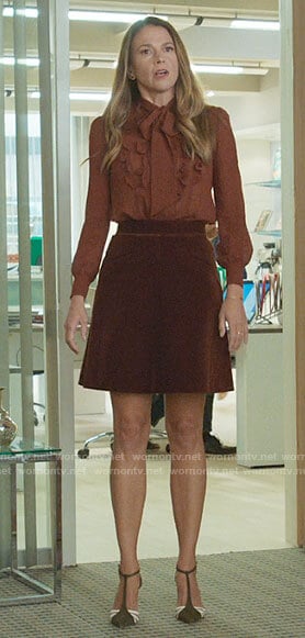 Liza's brown ruffled blouse and velvet skirt on Younger