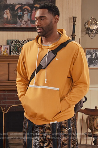 Moz’s yellow Nike hoodie on Family Reunion