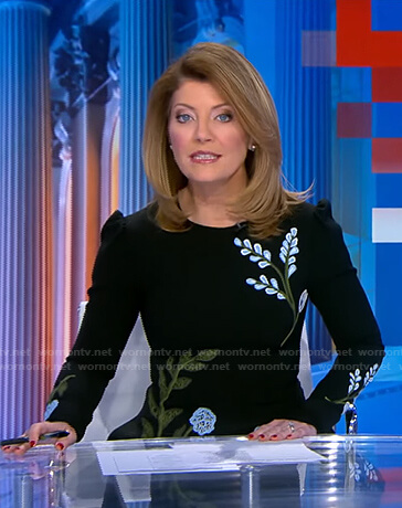 Norah’s black floral embroidered dress on CBS Evening News