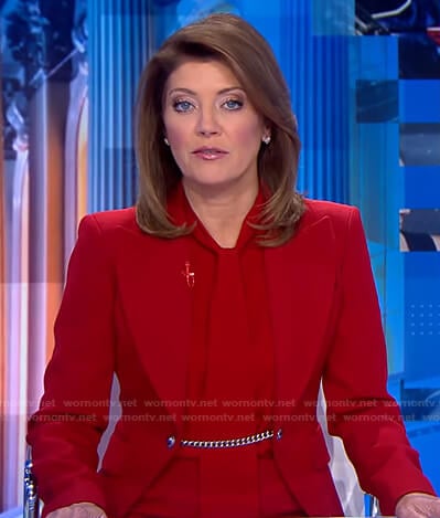 Norah’s red chain embellished blazer on CBS Evening News