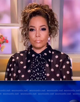 Sunny’s black polka dot tie neck blouse on The View