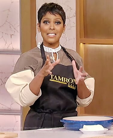 Tamron’s green two-tone puff sleeve dress on Tamron Hall Show