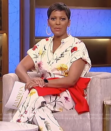 Tamron’s white floral jumpsuit on Tamron Hall Show