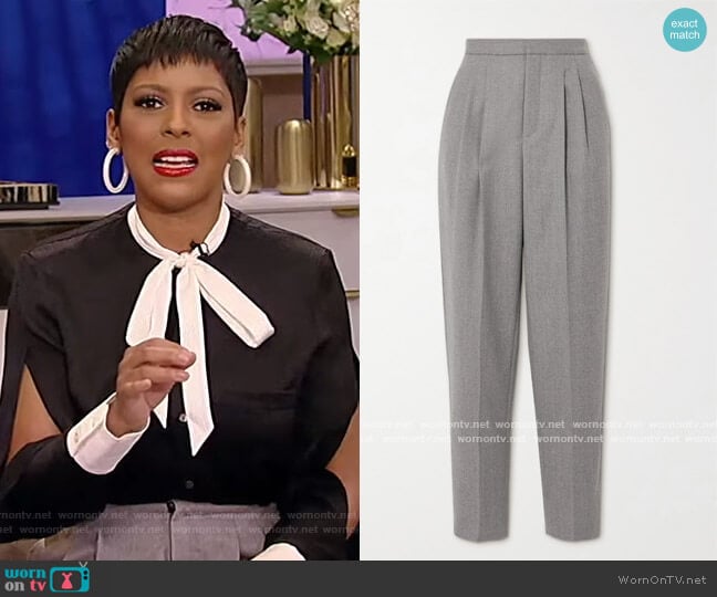 Pleated wool-twill tapered pants by Saint Laurent worn by Tamron Hall on Tamron Hall Show