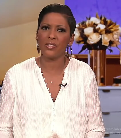 Tamron’s white pearl embellished top on Tamron Hall Show