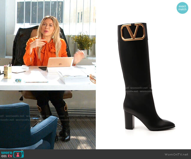 Supervee Logo Plaque Boots by Valentino worn by Kelsey Peters (Hilary Duff) on Younger