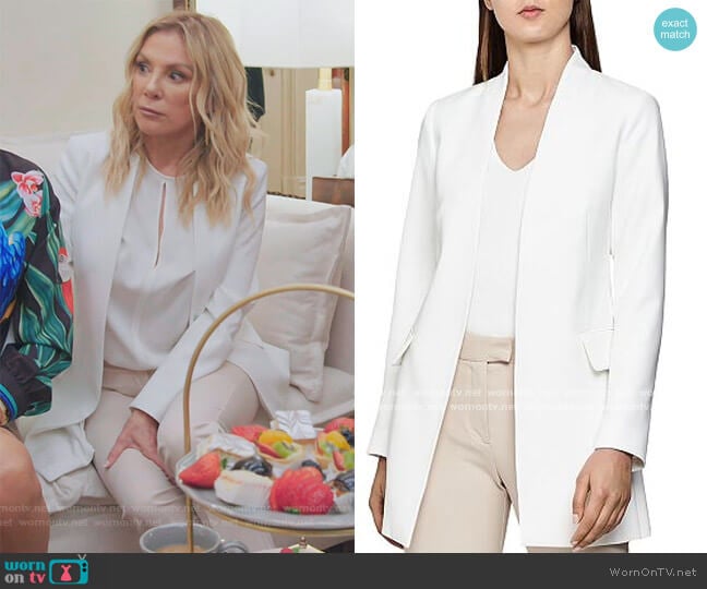 Tally Collarless Open Jacket and beige pants by Reiss worn by Ramona Singer on The Real Housewives of New York City