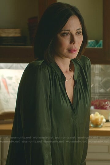 Cassie’s green v-neck blouse on Good Witch