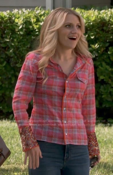 Gina’s pink plaid shirt with embellished cuffs on B Positive