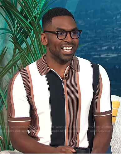 Justin’s brown, black and white striped polo shirt on E! News Daily Pop