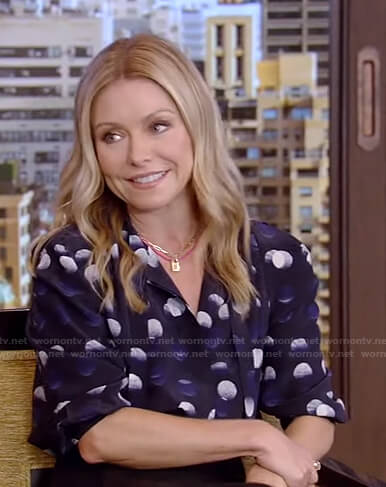 Kelly’s navy dotted tie neck blouse on Live with Kelly and Ryan