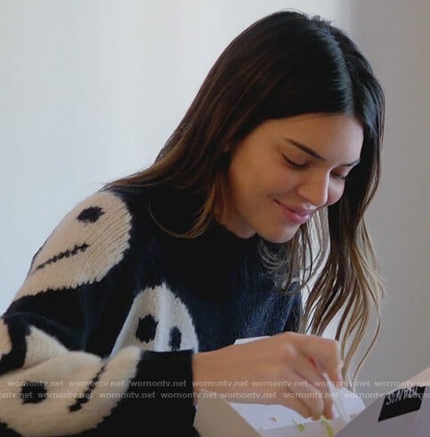 Kendall's black smiley face sweater on Keeping Up with the Kardashians