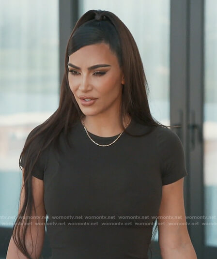 Kim's black short sleeve top on Keeping Up with the Kardashians