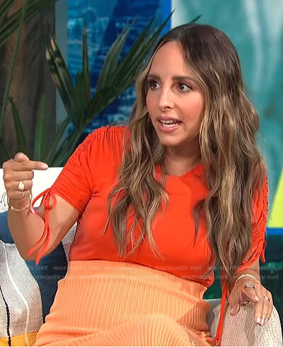 Lilliana's orange ruched sleeve top and ribbed skirt on E! News Daily Pop