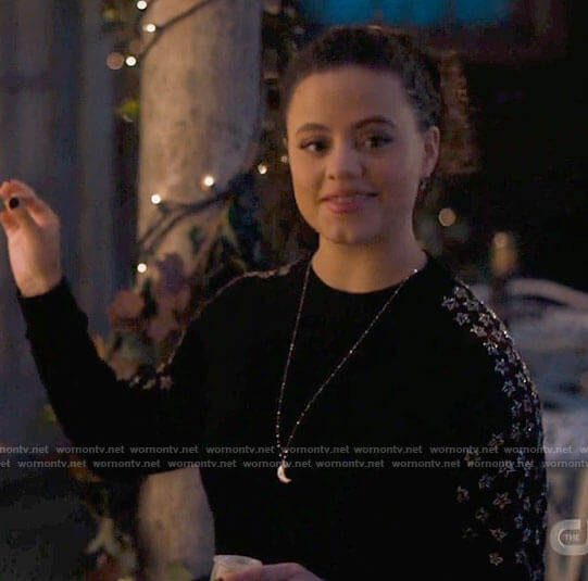 Maggie's black star embellished sweater on Charmed