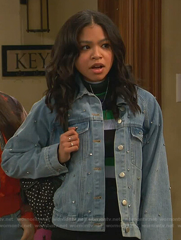Nia's green striped sweater and studded denim jacket on Ravens Home