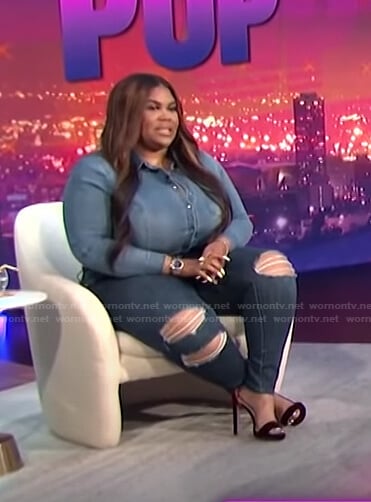 Nina’s chambray shirt and distressed jeans on E! News Nightly Pop