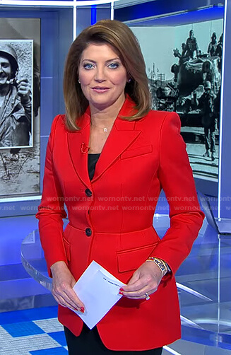 Norah’s red peplum blazer on CBS Evening News