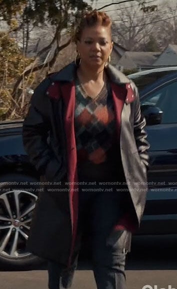 Robyn’s leather coat with red lining on The Equalizer