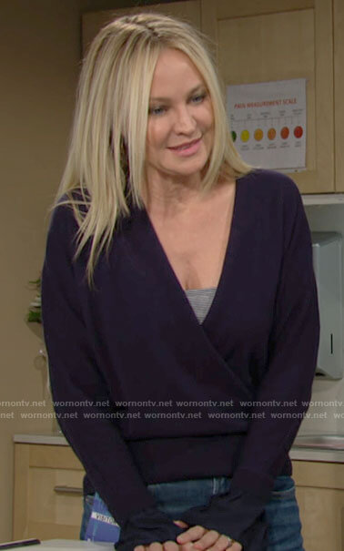 Sharon’s navy wrap front sweater on The Young and the Restless