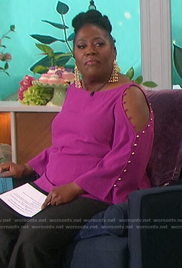 Sheryl’s pink button sleeve top on The Talk