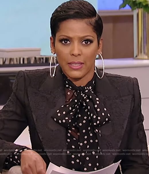 Tamron’s black polka dot blouse and blazer on Tamron Hall Show