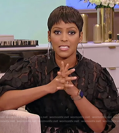 Tamron’s black dotted mesh top on Tamron Hall Show