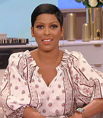 Tamron’s white floral print midi dress on Tamron Hall Show