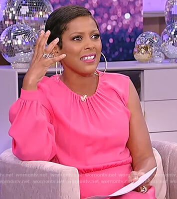 Tamron’s pink one sleeve dress on Tamron Hall Show