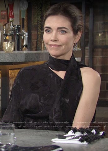 Victoria's black one-shoulder scarf neck blouse on The Young and the Restless