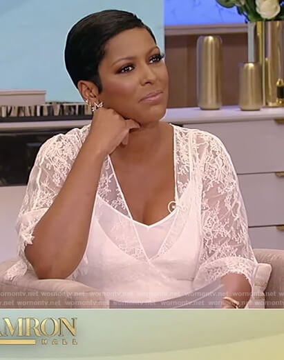 Tamron’s white lace jumpsuit on Tamron Hall Show