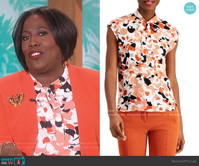 Printed Tie-Neck Top by Bar III worn by Sheryl Underwood on The Talk