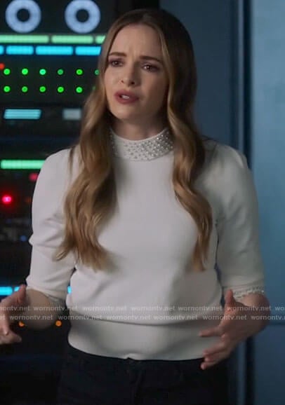 Caitlin's white pearl neck sweater on The Flash