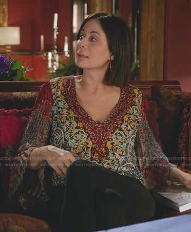 Cassie’s printed pleated sleeve top on Good Witch