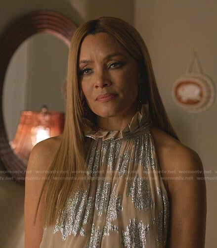 Dominique's metallic ruffle neck top and pleated skirt on Dynasty