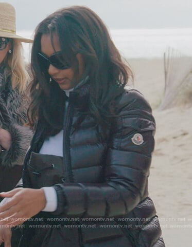 Eboni's brown puffer jacket and sunglasses on The Real Housewives of New York City