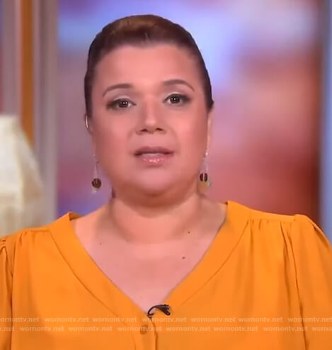 Ana’s yellow v-neck button down top on The View