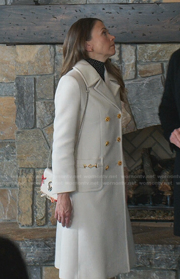 Liza’s white double breasted coat on Younger