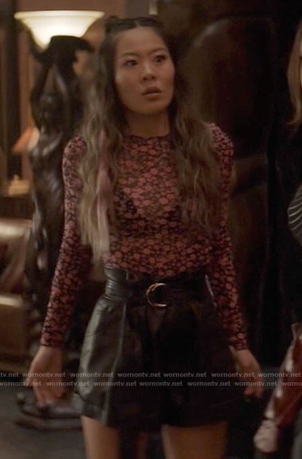 Mary's pink floral top and leather shorts on Batwoman