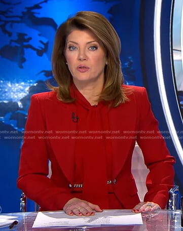 Norah’s red chain embellished blazer on CBS Evening News