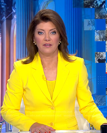 Norah's yellow blazer on CBS Evening News