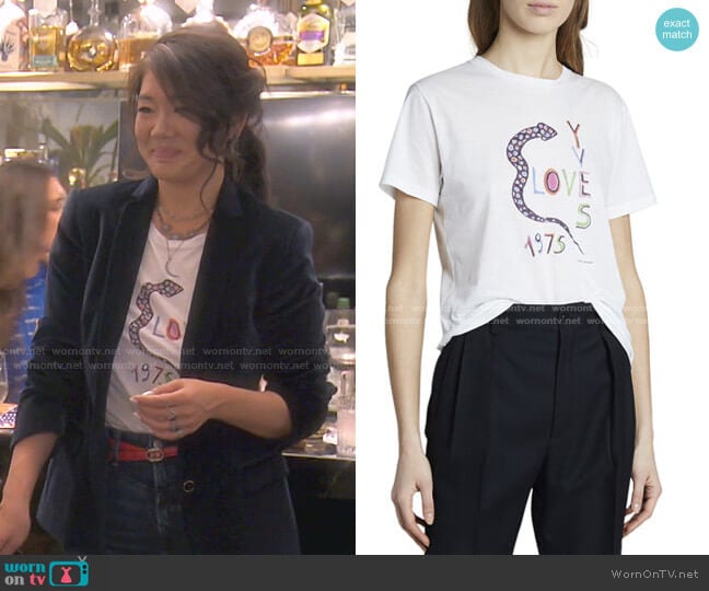 Yves Love 1975 Snake Logo Graphic T-Shirt by Saint Laurent worn by Crystal Kung Minkoff on The Real Housewives of Beverly Hills