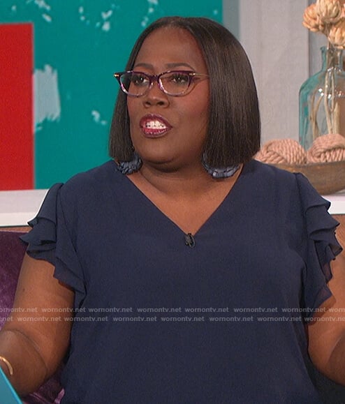 Sheryl’s blue ruffle sleeve top on The Talk