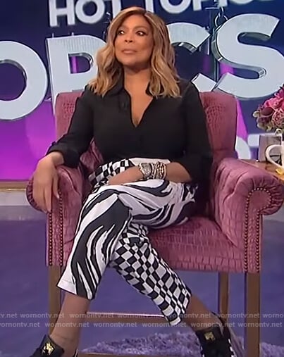 Wendy's black wrap blouse and printed pants on The Wendy Williams Show