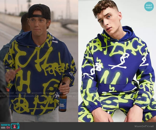 ASOS DESIGN coordinating oversized hoodie with all-over graffiti print worn by Zinn ( Nico Greetham) on American Horror Stories