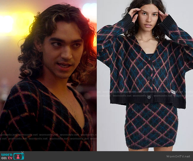 The Ragged Priest oversized cardigan in argyle knit worn by Dee (Ben J. Pierce) on American Horror Stories