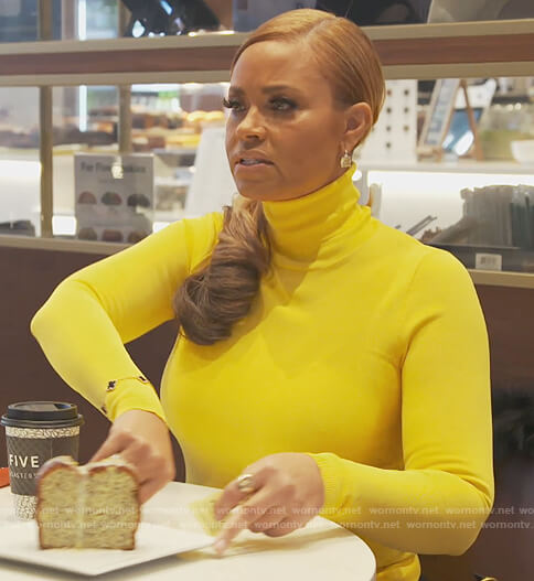 Gizelle's yellow turtleneck sweater on The Real Housewives of Potomac