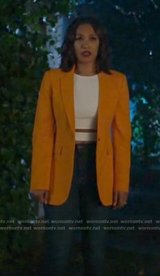 Iris's orange blazer on The Flash